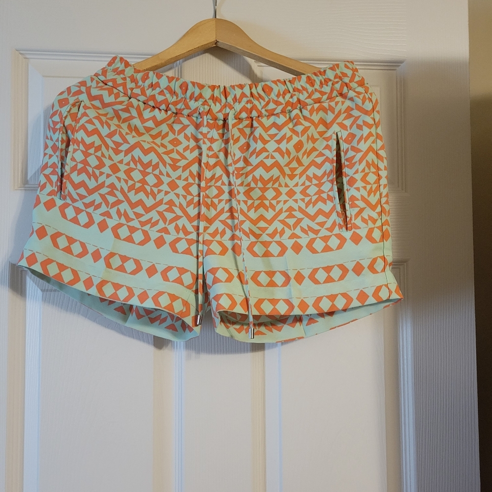 Orange and mint green shorts